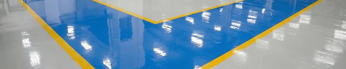 A factory floor professionally covered and marked with epoxy flooring in Buffalo, NY