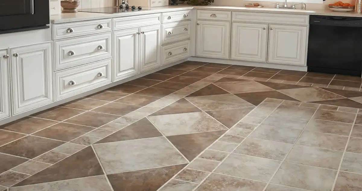 Kitchen with white cabinets and a professionally installed tile floor in Buffalo, NY