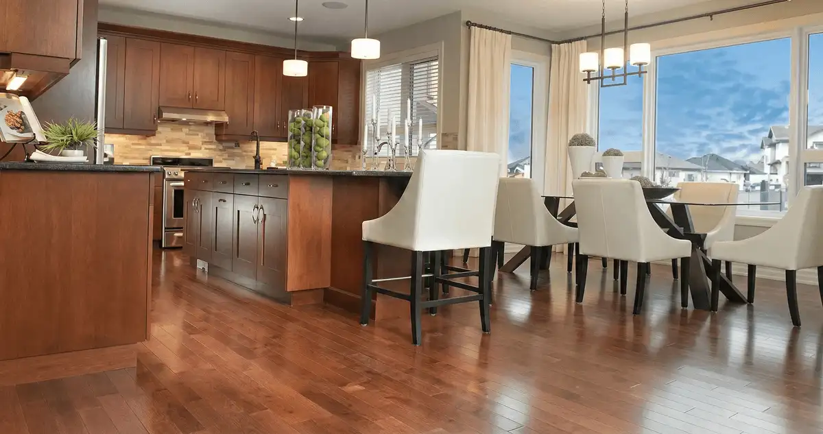 A modern kitchen with professionally installed wood flooring in Buffalo, NY